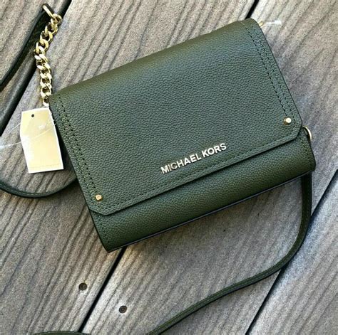 michael kors hayes small clutch crossbody|Michael Kors clutches on sale.